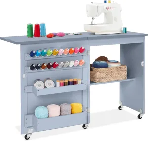 Best Choice Products Folding Sewing Table Multipurpose Craft Station & Side Desk with Compact Design, Wheels, Shelves, Storage Trays, Pegs, Magnetic Doors, Metal Doorknobs - Light Blue